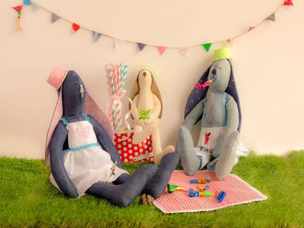 Handmade Cloth Rabbit Dolls Sitting On The Grass And Celebrating In Party Concept Professional Grade